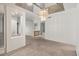 Spacious living area with neutral carpet and natural light, providing a comfortable and inviting atmosphere at 5200 S Lakeshore Dr # 120, Tempe, AZ 85283