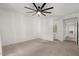 Large main bedroom boasts ceiling fan, carpet, and en suite bath and walk-in closet at 5200 S Lakeshore Dr # 120, Tempe, AZ 85283