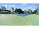 Well-maintained tennis court with surrounding fencing, providing a perfect space for sports and recreation at 5200 S Lakeshore Dr # 120, Tempe, AZ 85283