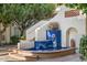 Charming courtyard with a tiled water fountain feature, adding a touch of elegance to the outdoor space at 5200 S Lakeshore Dr # 120, Tempe, AZ 85283