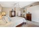 Spacious main bedroom with vaulted ceilings, ceiling fan and ensuite bathroom at 5341 W Bloomfield Rd, Glendale, AZ 85304