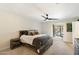 Comfortable bedroom with a large bed, stylish furnishings, and an ensuite bathroom at 5630 E Peak View Rd, Cave Creek, AZ 85331