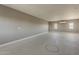A large bonus room with neutral walls, climate control and bright windows providing ample light for customization at 5630 E Peak View Rd, Cave Creek, AZ 85331