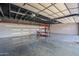 View of a 3-car garage interior offering ample storage space with organized shelving at 5630 E Peak View Rd, Cave Creek, AZ 85331
