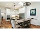 Bright, modern kitchen featuring stainless steel appliances and a granite-topped island with dining space at 5630 E Peak View Rd, Cave Creek, AZ 85331