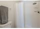 Clean bathroom featuring a shower and a toilet with a towel nearby at 5817 S Siesta Ln, Tempe, AZ 85283