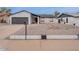 Charming single-Gathering home featuring a two-car garage and desert landscaping for low maintenance at 5817 S Siesta Ln, Tempe, AZ 85283
