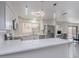 Bright kitchen boasts modern stainless steel appliances, sleek countertops, and a breakfast bar at 5817 S Siesta Ln, Tempe, AZ 85283