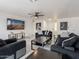 Spacious living room with modern furniture, ceiling fan, and bright natural light at 5817 S Siesta Ln, Tempe, AZ 85283