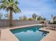 Backyard swimming pool features a meticulously maintained area for relaxation and entertainment at 5817 S Siesta Ln, Tempe, AZ 85283