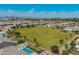Aerial view of a large community park with soccer fields, walking paths and a picnic shelter at 6550 S 24Th Pl, Phoenix, AZ 85042
