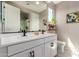 Modern bathroom featuring double sinks, sleek fixtures, and ample counter space at 6550 S 24Th Pl, Phoenix, AZ 85042
