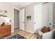 Inviting bedroom with hardwood floors, neutral tones, and stylish decor at 6550 S 24Th Pl, Phoenix, AZ 85042