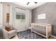 Charming Bedroom with wood floors, soft lighting, and modern decor at 6550 S 24Th Pl, Phoenix, AZ 85042