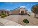 Beautiful single-story home featuring a neutral color palette, paver driveway, and low maintenance desert landscaping at 6550 S 24Th Pl, Phoenix, AZ 85042