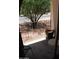 Balcony view features greenery and a scenic neighborhood view at 7120 E Wilshire Dr # 10, Scottsdale, AZ 85257