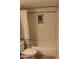 Cozy bathtub and shower with white subway tile and a shower curtain at 7120 E Wilshire Dr # 10, Scottsdale, AZ 85257