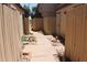 Exterior walkway between buildings with wooden privacy fences and xeriscaping at 7120 E Wilshire Dr # 10, Scottsdale, AZ 85257