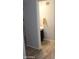 A half-bathroom with a modern dark vanity, stylish floors, and neutral wall color creates a cozy and functional space at 7120 E Wilshire Dr # 10, Scottsdale, AZ 85257