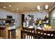 Bright kitchen features stainless steel appliances, granite countertops, and ample cabinet space at 7456 W Via Montoya Dr, Glendale, AZ 85310