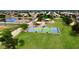 Aerial view of the community park with tennis courts, baseball field and playground in a beautiful neighborhood at 7625 W Dreyfus Dr, Peoria, AZ 85381