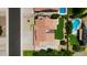 Aerial view of home featuring a tile roof, pool, and landscaped backyard at 7625 W Dreyfus Dr, Peoria, AZ 85381