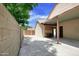 View of the side yard and garage area, with a covered parking spot, offering ample space at 7625 W Dreyfus Dr, Peoria, AZ 85381