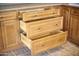 Kitchen drawers and cabinets made of wood with shiny metal handles at 7625 W Dreyfus Dr, Peoria, AZ 85381