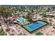 Aerial view of community amenities including a pool, tennis court, and clubhouse at 842 E Village Circle N Dr, Phoenix, AZ 85022