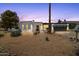 Charming home featuring desert landscaping, a modern exterior, and a two-car garage at 842 E Village Circle N Dr, Phoenix, AZ 85022