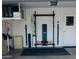 Garage featuring a work out area with a bench, free weights, and exercise accessories at 842 E Village Circle N Dr, Phoenix, AZ 85022