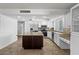 Spacious kitchen featuring stainless steel appliances, a large island, and bright-white cabinets at 842 E Village Circle N Dr, Phoenix, AZ 85022