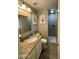 Modern bathroom featuring a walk-in shower with stylish tile and modern fixtures at 8632 E Thornwood Dr, Scottsdale, AZ 85251