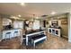 Open floor plan showcasing a spacious dining room with a large table and seating for six at 8632 E Thornwood Dr, Scottsdale, AZ 85251