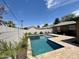 Backyard oasis featuring a pristine pool and spa, perfect for relaxation and outdoor entertainment at 8632 E Thornwood Dr, Scottsdale, AZ 85251