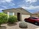 Charming home featuring a desert landscape, covered entry, neutral color scheme and a two car garage at 9825 W Trumbull Rd, Tolleson, AZ 85353