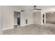Spacious room showcasing tile flooring and multiple entryways enhancing the openness at 1010 W 5Th Pl, Mesa, AZ 85201