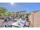 An inviting backyard featuring a shaded patio area, ideal for outdoor entertaining and dining at 11629 W Washington St, Avondale, AZ 85323