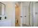 Neutral bathroom featuring a vanity, toilet room, and glass-enclosed shower at 11629 W Washington St, Avondale, AZ 85323