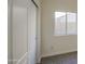 Bedroom with a window for natural light and a sliding door closet at 11629 W Washington St, Avondale, AZ 85323