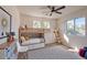 bedroom features a bunk bed and two windows that provide natural light at 11629 W Washington St, Avondale, AZ 85323