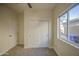 Bedroom featuring a window, ceiling fan, and sliding closet doors at 11629 W Washington St, Avondale, AZ 85323