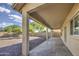 Extended view of backyard from covered patio, showcasing the outdoor space at 11629 W Washington St, Avondale, AZ 85323