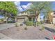 Charming two-story home with a two-car garage and well-kept desert landscaping at 11629 W Washington St, Avondale, AZ 85323