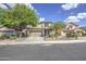 Inviting home with two-car garage, manicured desert landscaping, and a welcoming front entrance at 11629 W Washington St, Avondale, AZ 85323