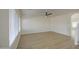 Bright living room with wood-look flooring, ceiling fan, and large windows with modern blinds at 11629 W Washington St, Avondale, AZ 85323