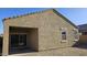 Back exterior featuring covered patio, stucco walls and an adjacent side yard at 1246 E Thomas Dr, Casa Grande, AZ 85122