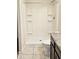 Bathroom showcasing a modern white shower with a built-in shelving, plus a convenient toilet, and granite counter at 1246 E Thomas Dr, Casa Grande, AZ 85122