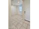 Tiled entryway showcasing the front door and bright, open floor plan at 1246 E Thomas Dr, Casa Grande, AZ 85122