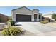 Charming single-story home featuring a spacious driveway and low-maintenance landscaping at 1246 E Thomas Dr, Casa Grande, AZ 85122